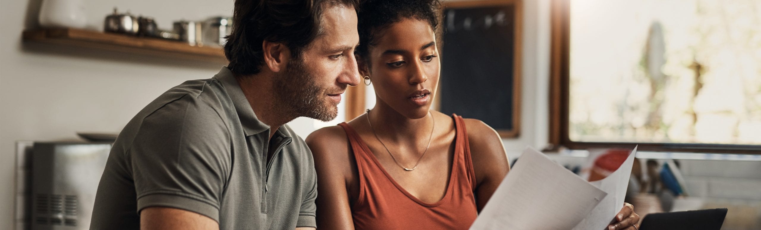 Couple viewing paperwork