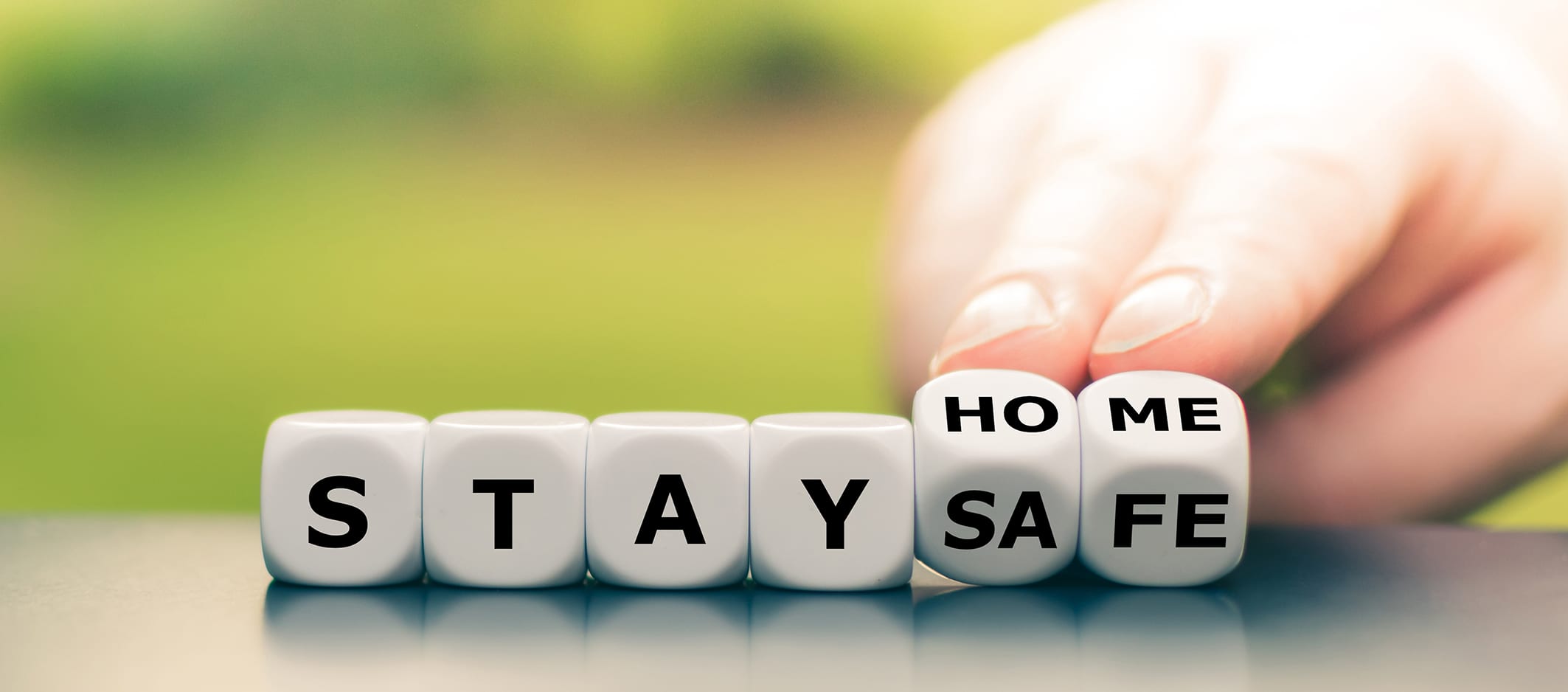 Dice form the expression "stay home, stay safe".