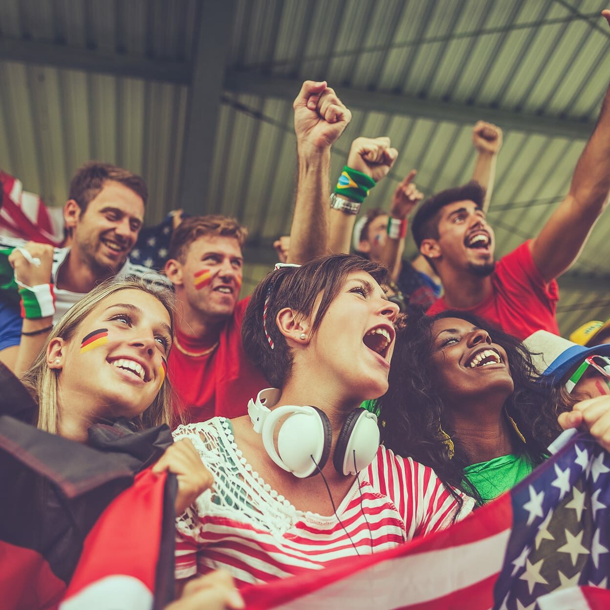 people cheering Group of different nations supporters together