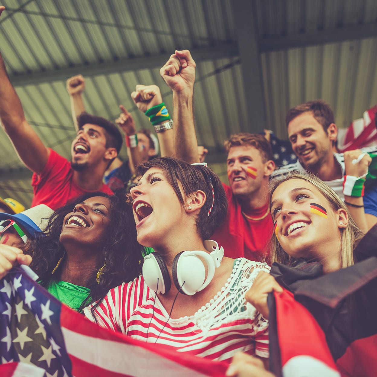 people cheering Group of different nations supporters together