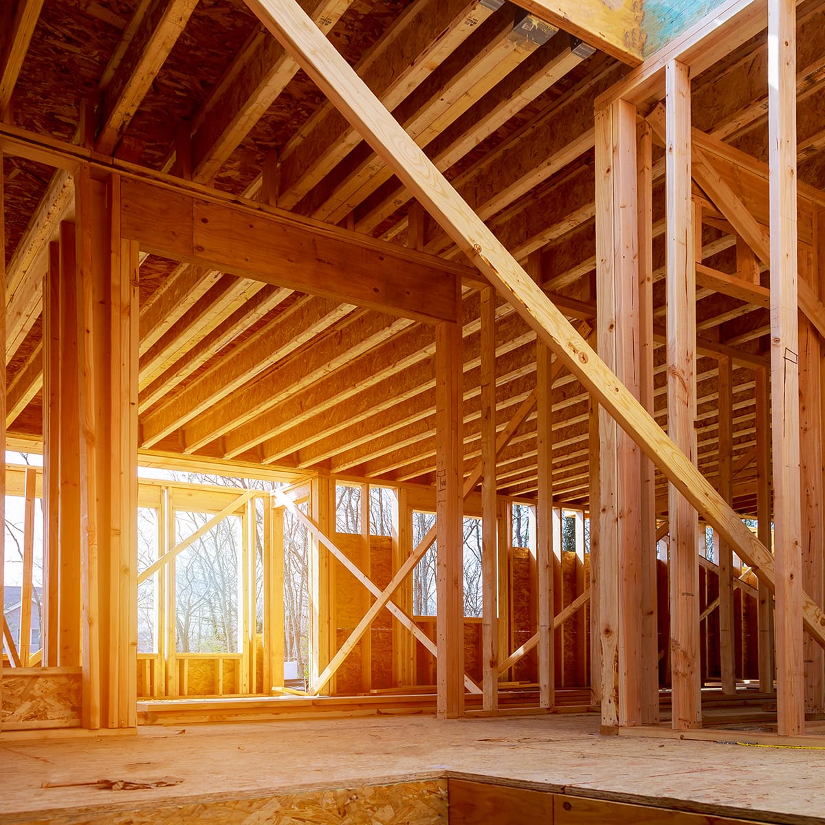 Interior view of a house under construction home framing