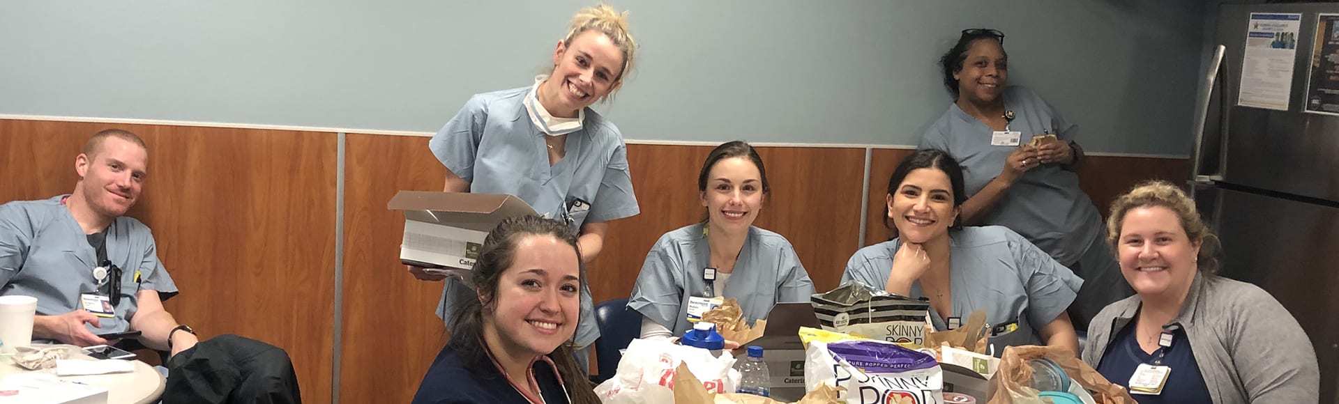 community lunch with nurses and donuts