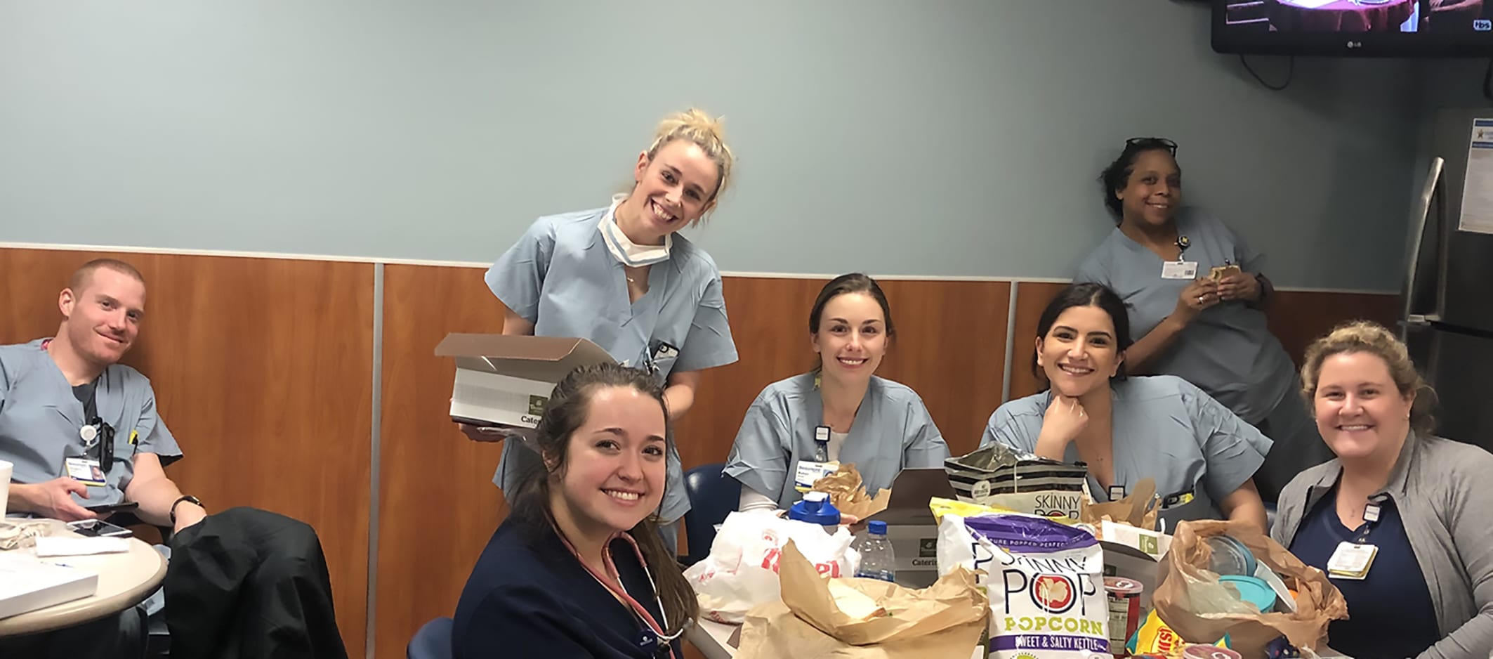 community lunch with nurses and donuts