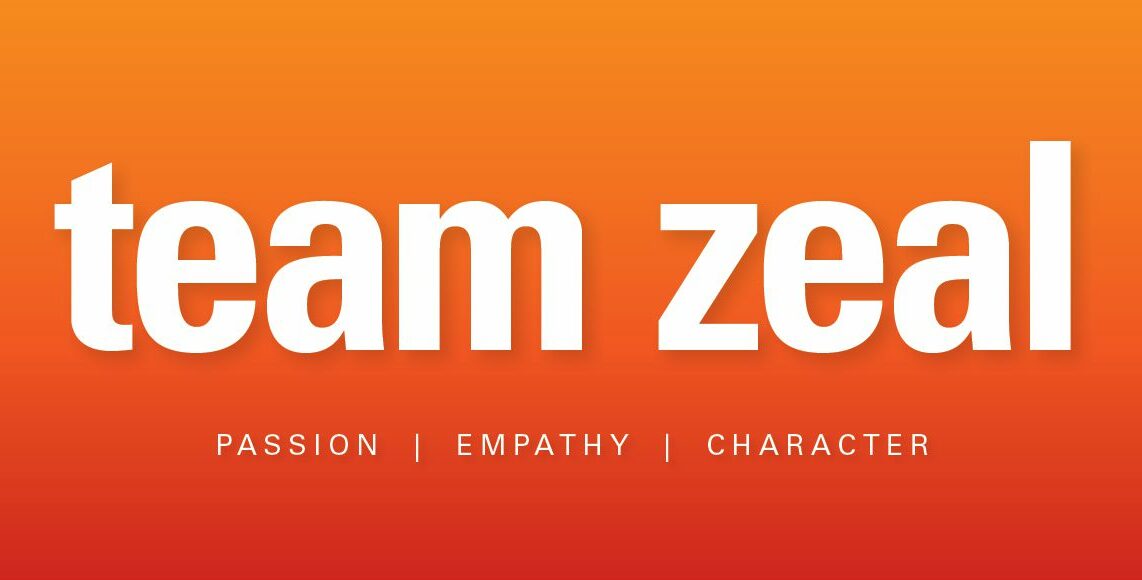 White text on orange background reads "Team Zeal"